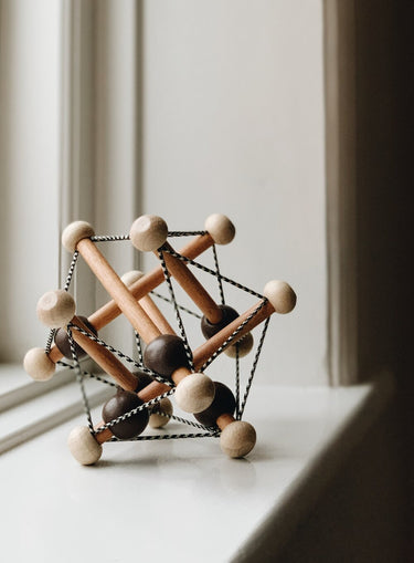 Skwish Rattle in Dark Brown from Manhattan Toy Company